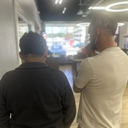 Impact Barber Academy - My student and I with fresh cuts
