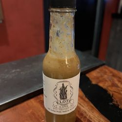 Elote Cafe - House-made habanero hot sauce