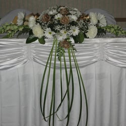Flowers Gifts & More - They even colored the roses to match with the gold decor. How thoughtful!