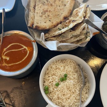 Saffron - South - Garlic Naan Chicken Tikka Masala Steamed Basmati Rice - Indian Near Me - Austin, Texas Saffron - South - Garlic Naan Chicken Tikka Masala Steamed Basmati Rice - Indian Near Me - Austin, Texas