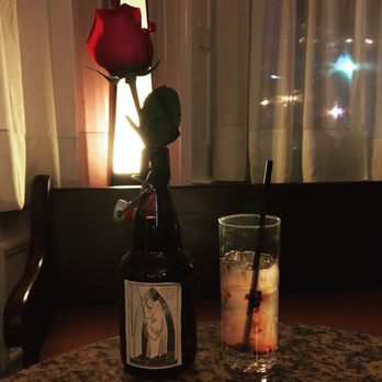 Monks Bar - a bottle of alcohol and a glass of water on a table - Pubs Near Me - Pittsburgh, Pennsylvania Monks Bar - a bottle of alcohol and a glass of water on a table - Pubs Near Me - Pittsburgh, Pennsylvania