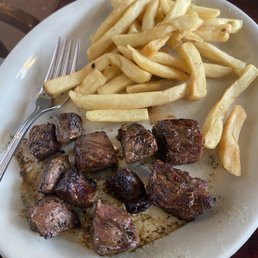 steak and fries on a plate steak and fries on a plate