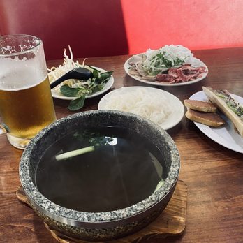 The One Pho - The stone bowl pho with choice ribeye and baked beef bone marrow. To. Die. For. Chase it down with your favorite beer or wine. - Vietnamese Near Me - Austin, Texas The One Pho - The stone bowl pho with choice ribeye and baked beef bone marrow. To. Die. For. Chase it down with your favorite beer or wine. - Vietnamese Near Me - Austin, Texas
