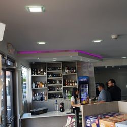 am:pm - They have a small bar there, great place, clean and terrific service.