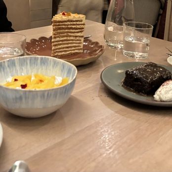 Ema - Desserts! Left: Vanilla Bean Panna Cotta; Center: Honey Cake; Right: Warm Sticky Date Cake! - Mediterranean Near Me - Glenview, Illinois Ema - Desserts! Left: Vanilla Bean Panna Cotta; Center: Honey Cake; Right: Warm Sticky Date Cake! - Mediterranean Near Me - Glenview, Illinois