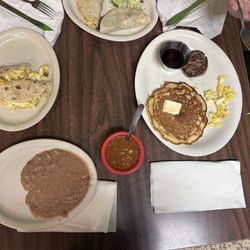 Three tacos with egg & potato. one taco with fajita. & pancake.
