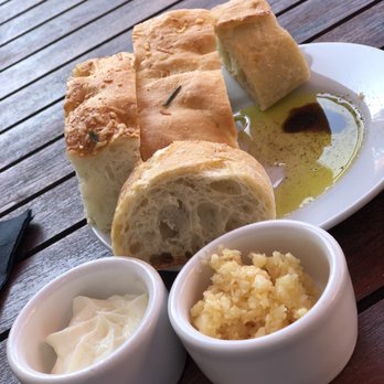 Spaghettini - Fresh Parmesan focaccia and baguette with olive oil and balsamic vinaigrette, fresh garlic and house made butter - Italian Near Me - Seal Beach, California