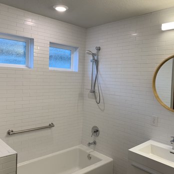 Santana Painting Services - Shower and tub combo with the copper round mirrors - Painters Near Me Santana Painting Services - Shower and tub combo with the copper round mirrors - Painters Near Me