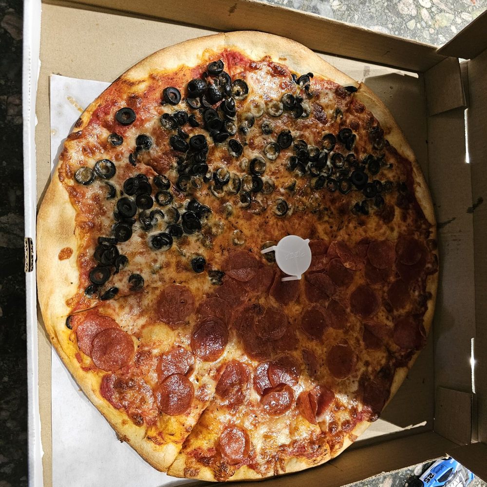 Half pepperoni, half black olive. Not bad Half pepperoni, half black olive. Not bad