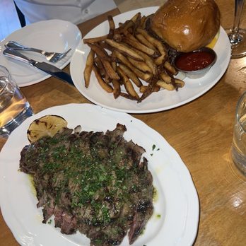 GusGus - Ribeye steak with chimmichurri and burger with fries. - Bars Near Me - Saint Paul, Minnesota GusGus - Ribeye steak with chimmichurri and burger with fries. - Bars Near Me - Saint Paul, Minnesota
