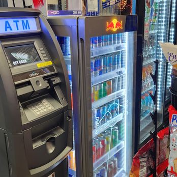 Faizan Petroleum - a vending machine in a convenience store - Vape Shops Near Me - Ormond Beach, Florida