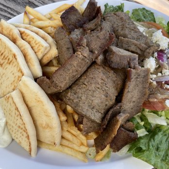 Spiro's Mediterranean Cuisine - Lamb and Beef Gyro platter with Greek Salad, Tzatziki sauce, Pita Bread, and fries - Mediterranean Near Me - La Jolla, California Spiro's Mediterranean Cuisine - Lamb and Beef Gyro platter with Greek Salad, Tzatziki sauce, Pita Bread, and fries - Mediterranean Near Me - La Jolla, California