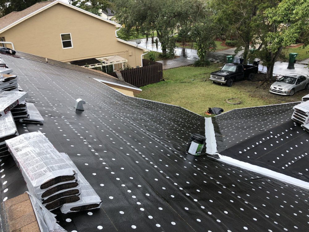 Slide of Aqua Roofing