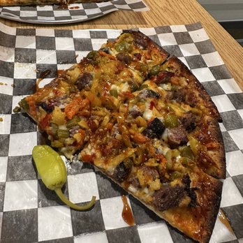 Novel Pizza Cafe - Pizza Near Me - Chicago, Illinois Novel Pizza Cafe - Pizza Near Me - Chicago, Illinois