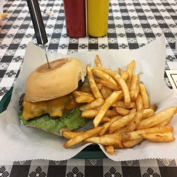 Shooters Grille - a burger and french fries on a table - American Near Me - Hoover, Alabama Shooters Grille - a burger and french fries on a table - American Near Me - Hoover, Alabama