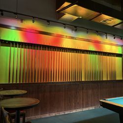 Slick Willie's Family Pool Halls - Wall of pool sticks