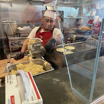 The Taco Stand - Coolest part of the experience! The tortilla guy hand making the tortillas for today's tacos. - Mexican Near Me - Mission Viejo, California