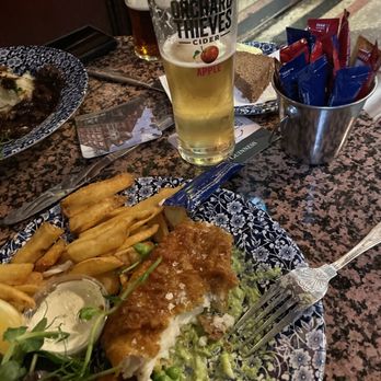 The Stag's Head - Delicious haddock and chips with salad and mushy peas. Paired with an orchard thieves cider! What a great day! - Irish Pub Near Me - Dublin, D The Stag's Head - Delicious haddock and chips with salad and mushy peas. Paired with an orchard thieves cider! What a great day! - Irish Pub Near Me - Dublin, D