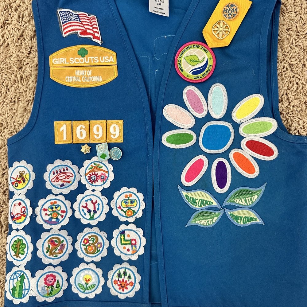 Vest of all patches sewn on. Vest of all patches sewn on.