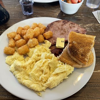 Brekkies - The huge breakfast thingy with four eggs, bacon, sausage, and ham plus tots! - Breakfast & Brunch Near Me - Solvang, California Brekkies - The huge breakfast thingy with four eggs, bacon, sausage, and ham plus tots! - Breakfast & Brunch Near Me - Solvang, California