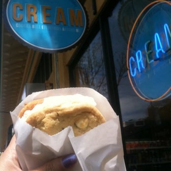 CREAM - Coconut between two White Choc Mac cookies! - Desserts Near Me - Berkeley, California CREAM - Coconut between two White Choc Mac cookies! - Desserts Near Me - Berkeley, California
