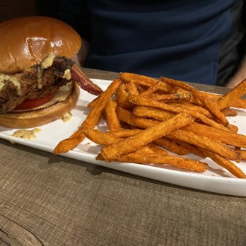 Ruhe152 - Seasoned buttermilk chicken sandwich...it was gooooddd. Fried chicken sandwich with bacon. Sweet potato fries were delish. - New American Near Me - Nappanee, Indiana