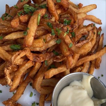 The Abbey - truffle fries with roasted garlic mayo (no parmesan cheese) - New American Near Me - Brookline, Massachusetts The Abbey - truffle fries with roasted garlic mayo (no parmesan cheese) - New American Near Me - Brookline, Massachusetts