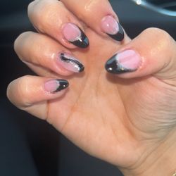 V Nails & Spa - In person they are very cloudy there's hairs and nail dust in my nails!