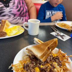 Waffle House - They are various dishes in this photo but they all look tasty