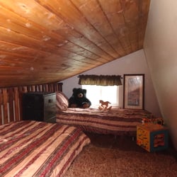 Cabin Fever Vacation Rental - Cozy loft with two twin beds, enjoyed by kids of all ages - Another great spot for reading a good book!