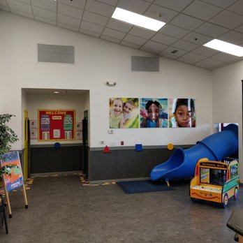 Creative Kids - Centennial Hills - Front reception area with a slide for the kids to use as entrance from the outside - Preschools Near Me - Las Vegas, Nevada Creative Kids - Centennial Hills - Front reception area with a slide for the kids to use as entrance from the outside - Preschools Near Me - Las Vegas, Nevada