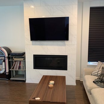 Excel Technology Integration - TV mount on ceramic tile fireplace wall - TV Mounting Near Me - Chicago, Illinois Excel Technology Integration - TV mount on ceramic tile fireplace wall - TV Mounting Near Me - Chicago, Illinois