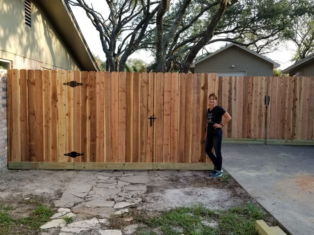 Slide of Pride of Texas Roof and Fence