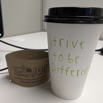 Not Your Average Joe - Cup of coffee with Strive to be different hand written - Coffee & Tea Near Me - Oklahoma City, Oklahoma