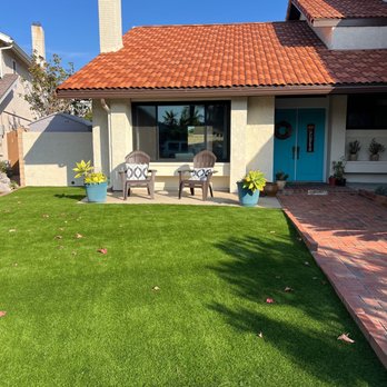 Genuine Coatings - After with brown Fascia, Gutters and Eaves, New painted Chimney and Clay tiles in checker pattern. - Painters Near Me Genuine Coatings - After with brown Fascia, Gutters and Eaves, New painted Chimney and Clay tiles in checker pattern. - Painters Near Me