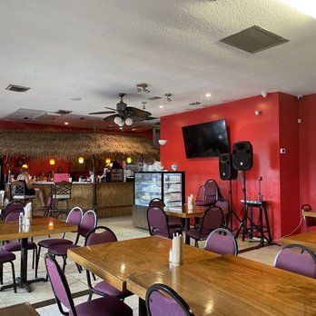 Tipico Café Latino - tables and chairs in a restaurant - Latin American Near Me - Rockledge, Florida