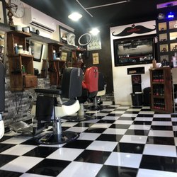 Cheque Barbershop - El interior de la barbería