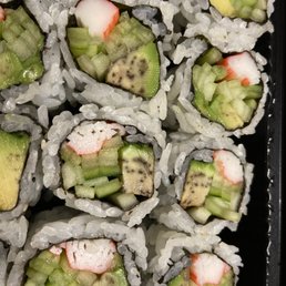 a tray of sushi rolls a tray of sushi rolls