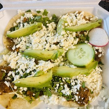 Erick's Tacos - a close up of a taco - Mexican Near Me - San Antonio, Texas