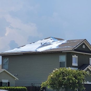 Florida Premier Roofing - The tarp is deteriorating and tearing after nine months on my roof - Roofing Near Me - Orlando, Florida