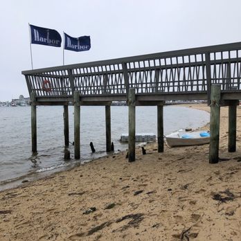 Harbor Lounge - a boat on the beach under a pier - Lounges Near Me - Provincetown, Massachusetts Harbor Lounge - a boat on the beach under a pier - Lounges Near Me - Provincetown, Massachusetts