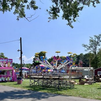 Ulster County Fair - 8/1/24 the midway in the distance - Amusement Parks Near Me - New Paltz, New York Ulster County Fair - 8/1/24 the midway in the distance - Amusement Parks Near Me - New Paltz, New York