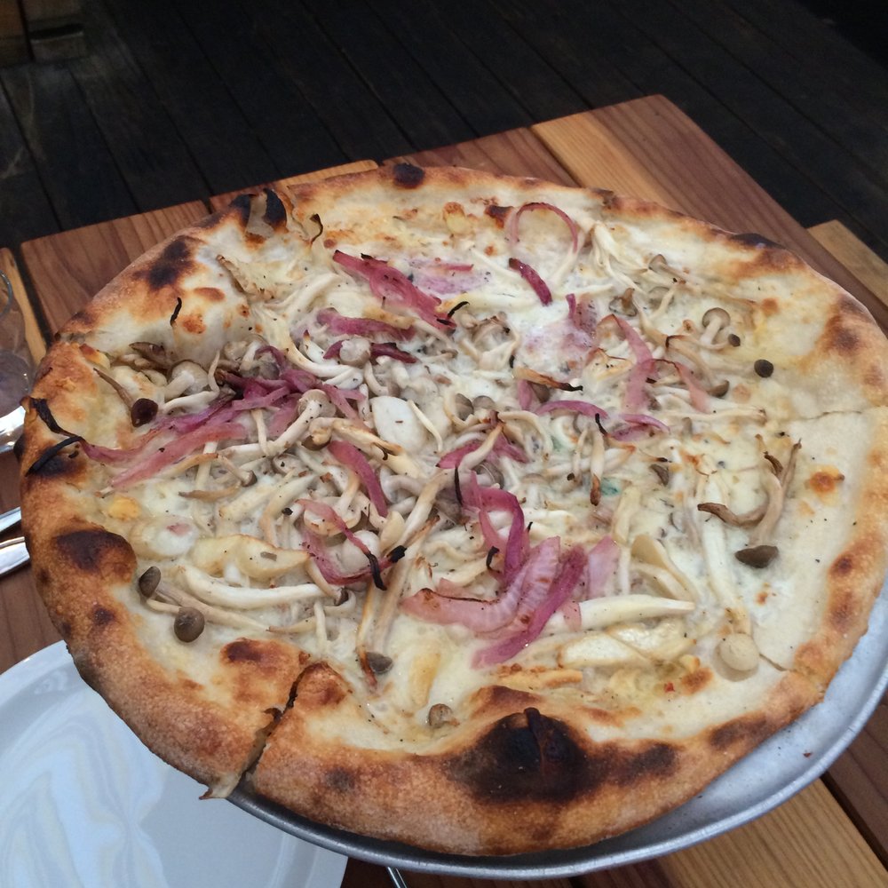 Starbelly - Market mushrooms, cave aged gruyere, thyme & roasted onions pizza - New American Near Me - San Francisco, California Starbelly - Market mushrooms, cave aged gruyere, thyme & roasted onions pizza - New American Near Me - San Francisco, California