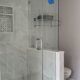 Master bathroom wall tile and shower glass enclosure. Highly recommend a towel hook Master bathroom wall tile and shower glass enclosure. Highly recommend a towel hook