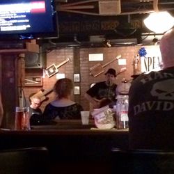 Speals Tavern - Live blues. Notice the handmade cigar box guitars on the wall