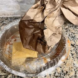 This is my take home meal, with the bag soaked in oil and the staple that ended up in my bread.