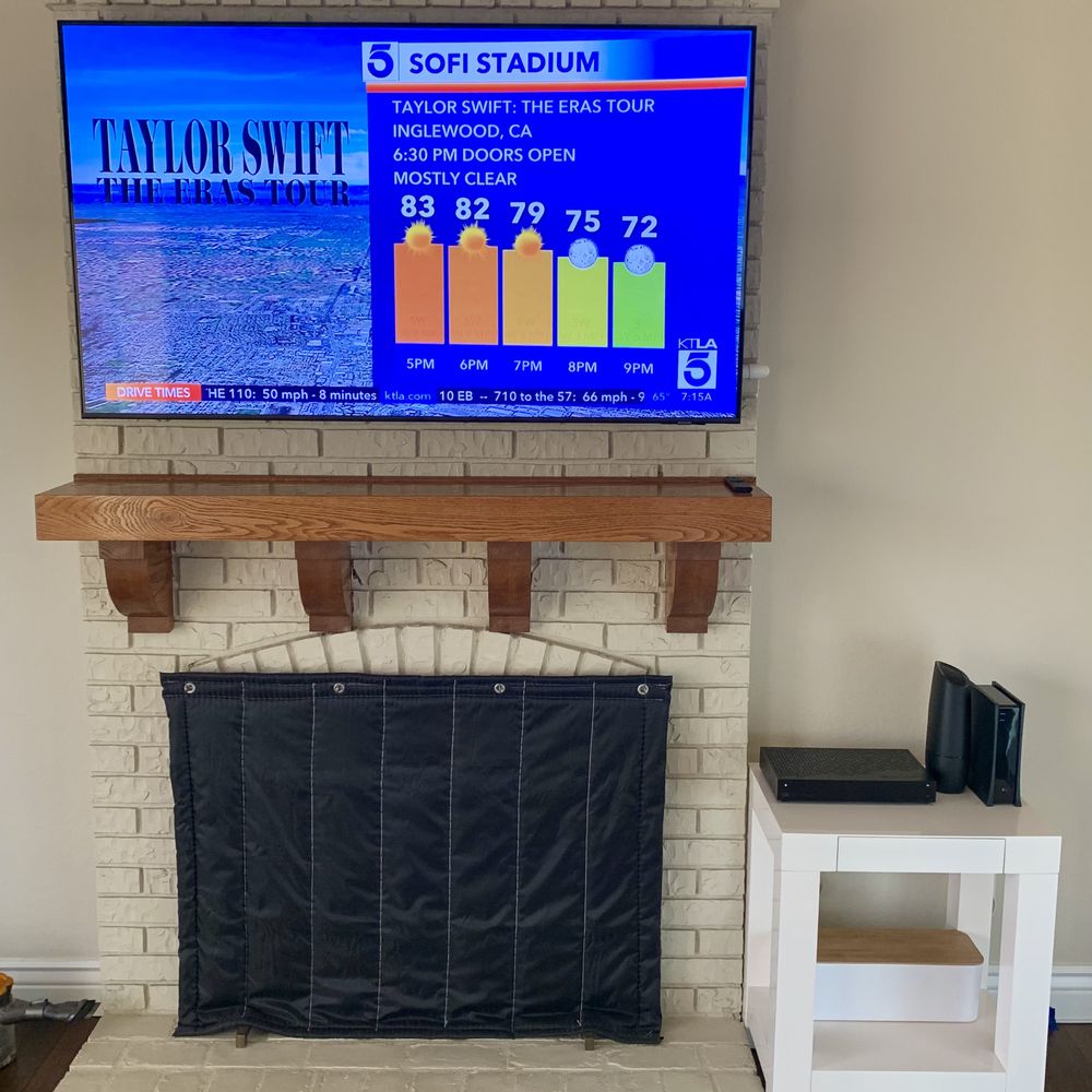 Modtech Design - 60 Samsung hung on brick fireplace using a fixed tilt mount. Hid the cables using a raceway down the right side to blend into the wall. - Home Theatre Installation Near Me Modtech Design - 60 Samsung hung on brick fireplace using a fixed tilt mount. Hid the cables using a raceway down the right side to blend into the wall. - Home Theatre Installation Near Me