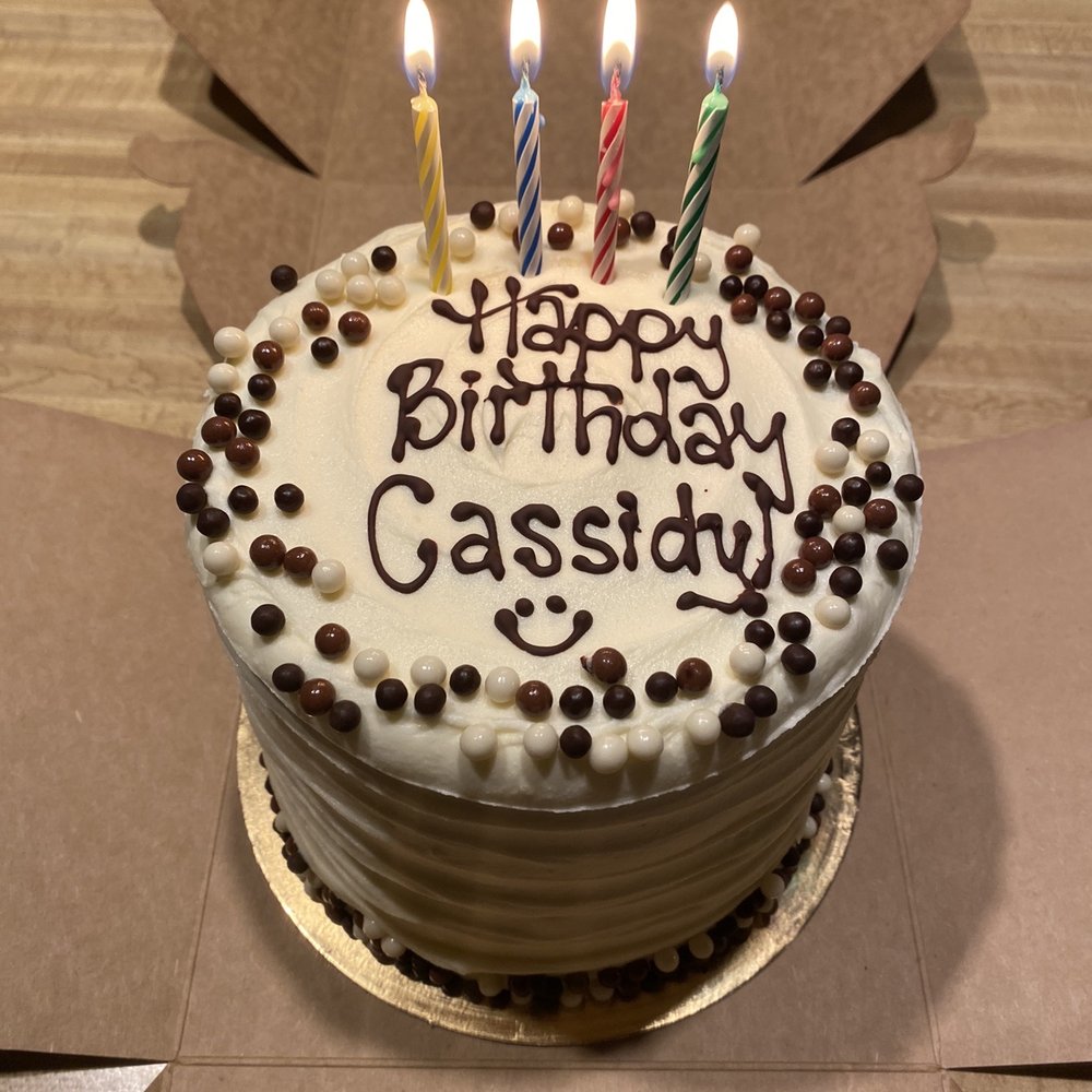 Cornerstone Bakery - Delicious tall 6" chocolate birthday cake filled with strawberries and chocolate buttercream, topped with cream cheese frosting - Bakeries Near Me - Truckee, California