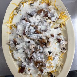 Scotts Grill - The famous Chicken bacon ranch potato! People come from miles for this potatoe