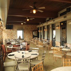 Fireworks Restaurant - An enclosed sun room that allows guests to view the rain garden. Available for private events.